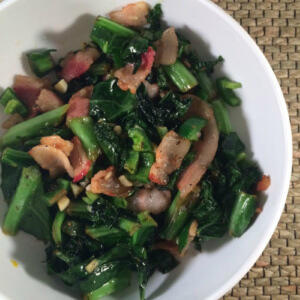 spicy mixed greens with bacon