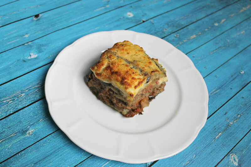 a piece of healthy moussaka on a white plate