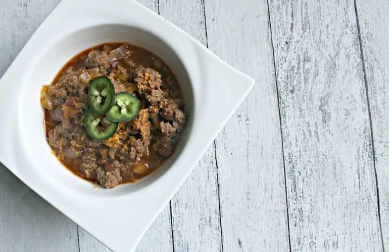 overhead shot of a plate of easy healthy chili made with grass-fed ground beef and no beans
