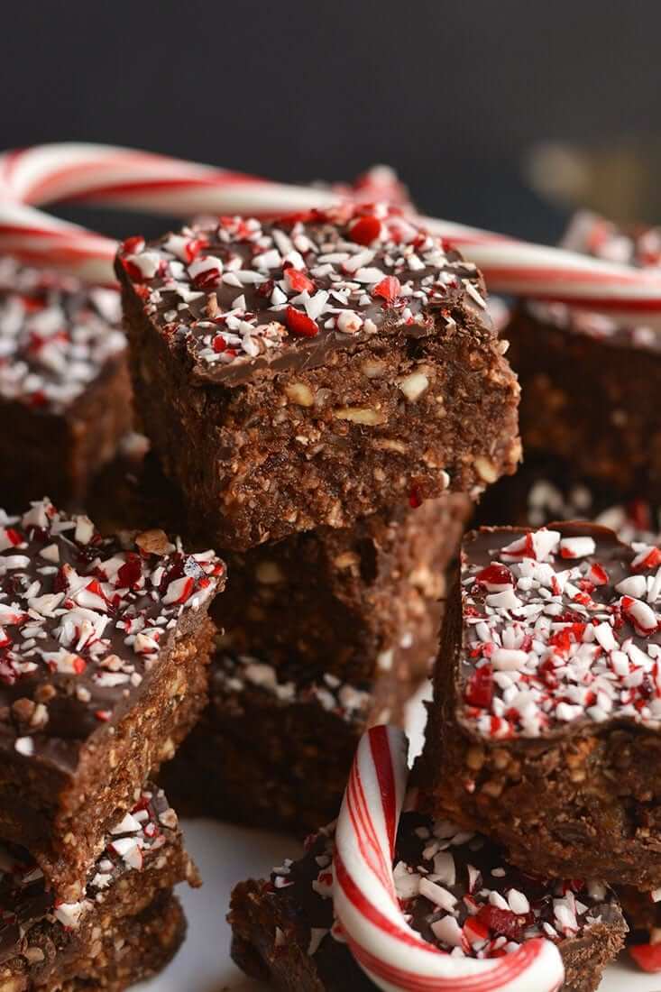 Raw Gluten-free Paleo Peppermint Brownies stacked on top of each other