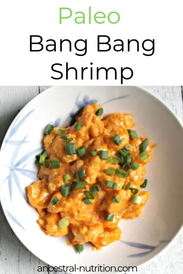  Paleo bang bang shrimp are tender, spicy, and creamy! They make a fantastic healthy low carb seafood dinner recipe and are paleo, gluten-free, grain-free, refined-sugar-free, and so delish. Serve with rice or cauliflower rice #sugarfree #shrimp #seafood #paleorecipes. 