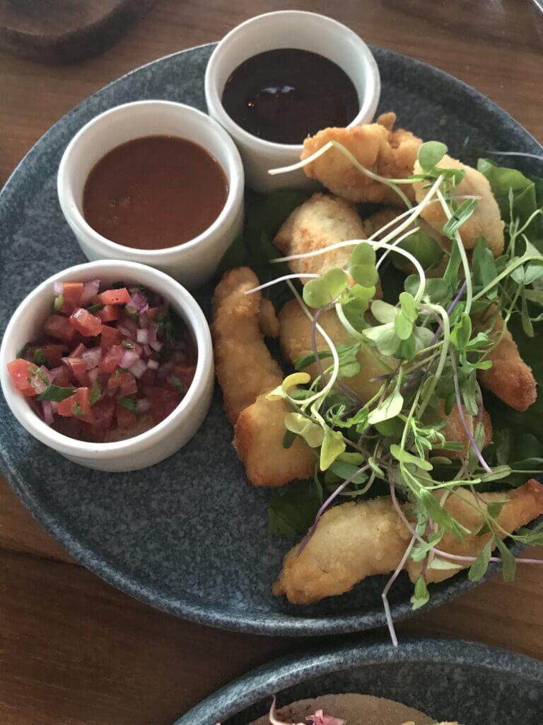 overhead shot of a gluten-free appetizer served at the Real Coconut restaurant in Tulum 