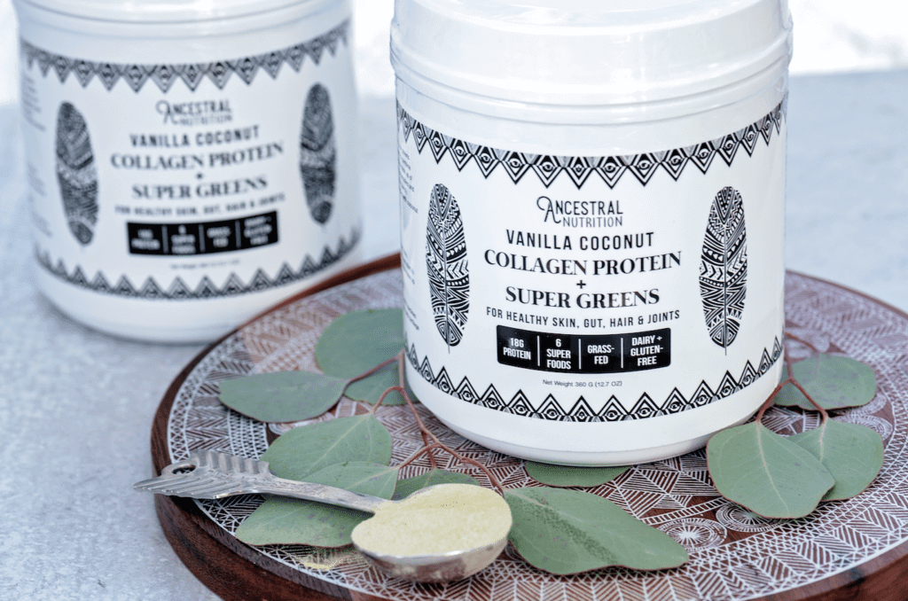 two tubs of organic collagen protein and super greens powder used to prevent stretch marks during pregnancy