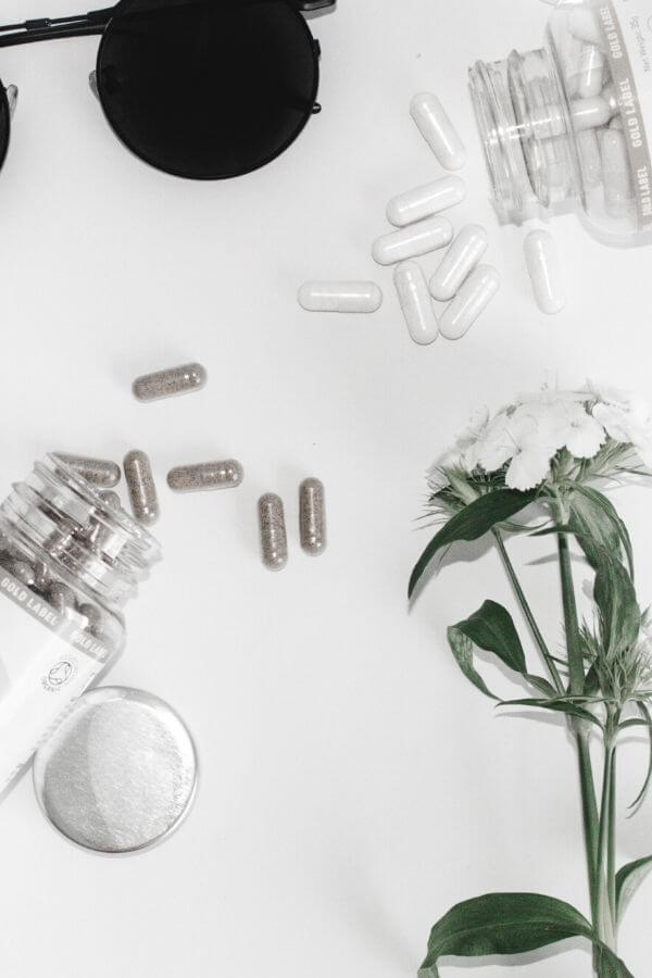 collagen supplements spread out on a table 