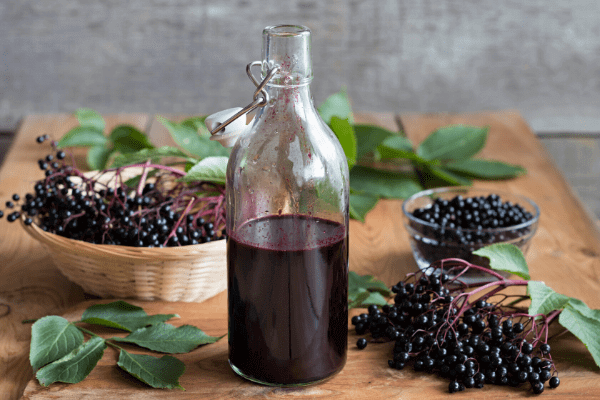 a bottle with immune boosting elderberry syrup perfect for fighting off viruses