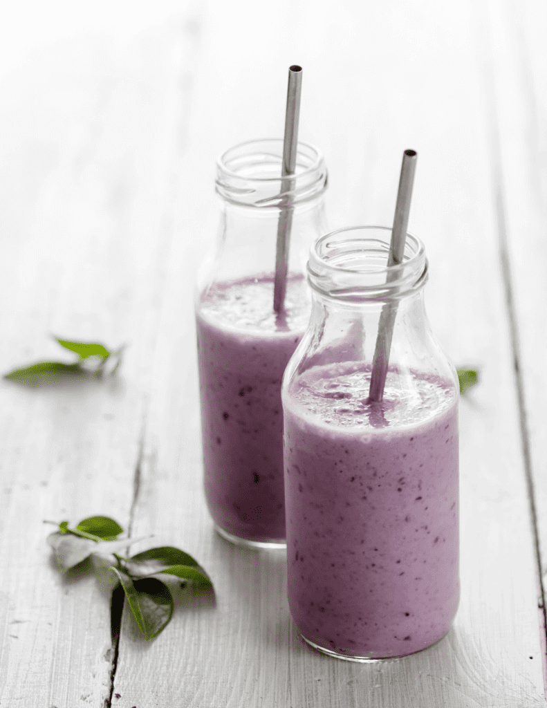 healthy collagen smoothie in glass bottles