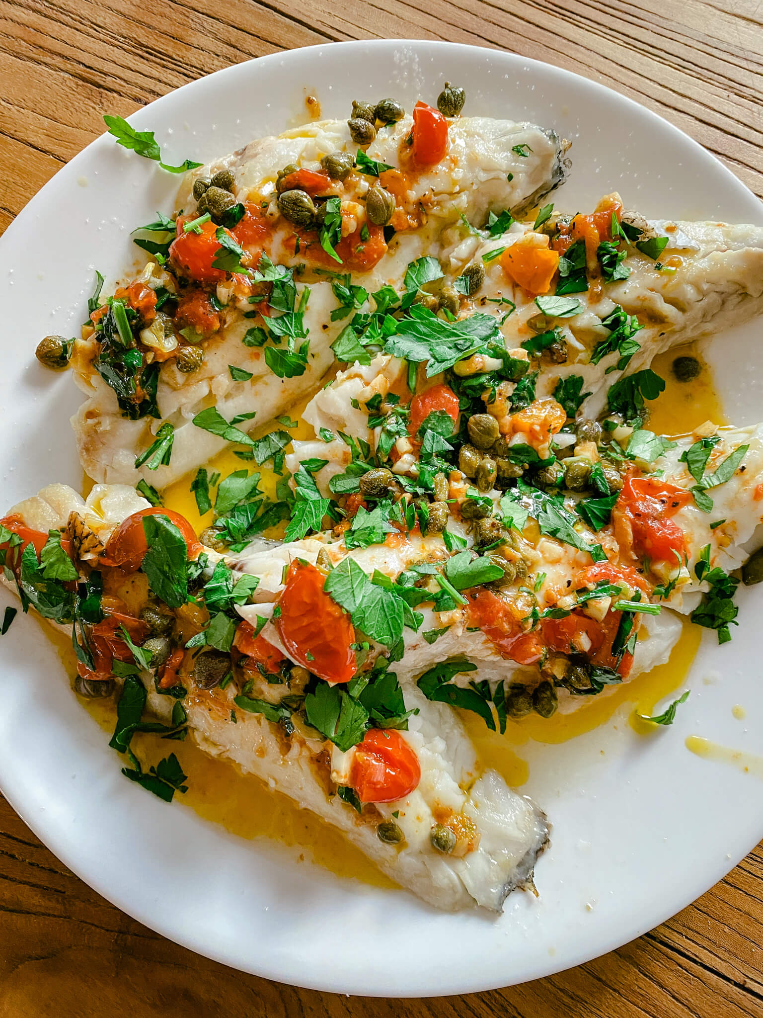 Sea Bass with Herbs, Tomatoes & Capers - Ancestral Nutrition